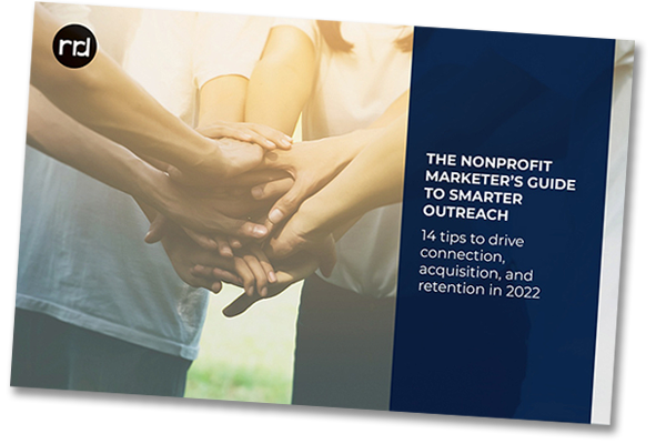 Four people putting their hands together as a team. Cover for The Nonprofit Marketer's Guide to Smarter Outreach